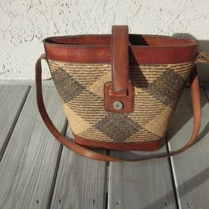vintage straw and leather bag